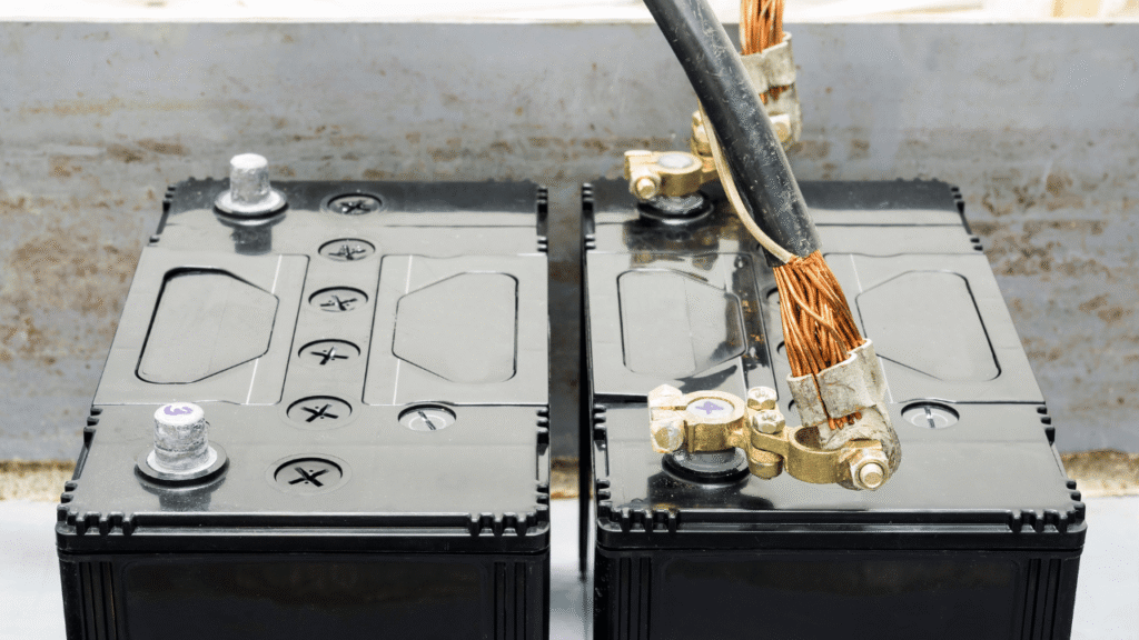 High-quality, scientifically accurate image of a battery temperature monitoring system, with a clear focus on the temperature display and control panel. The scene should be well-lit, with a clean, technical aesthetic. The device should be prominently featured, with a neutral background that emphasizes its function and design. The overall mood should convey a sense of precision, reliability, and technical expertise, suitable for an informative article on battery usage and safety. ১২V / ২৪V ব্যাটারি ব্যবহারের নিরাপদ টিপস